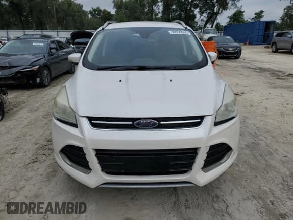 ✅ 2015 Ford Escape Titanium • VIN: 1FMCU0J92FUA87685 • Lot: 90396065. Wystawiony na Copart z przebiegiem 216 520 mil. Bezpłatny archiwum sprzedaży aukcyjnych z USA i szczegółowy raport historii pojazdu na DreamBid. Zdjęcie 5.