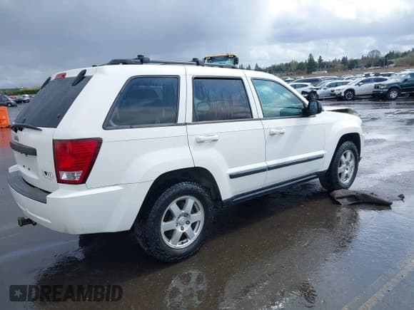 ✅ 2008 Jeep Grand Cherokee Laredo • VIN: 1J8GR48KX8C164165 • Lot: 41920548. Listed on IAAI with 215,545 mi. Free auction sales archive from the USA and detailed vehicle history report at DreamBid. Image 4.