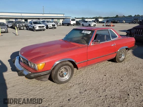 ✅ 1979 Mercedes-Benz SL • VIN: 10704412056368 • Лот: 76624824. Опубликован ранее на Copart с пробегом 51 488 миль. Бесплатный доступ к архиву аукционных продаж из США и подробный отчёт об истории автомобиля на DreamBid. Изображение 1.