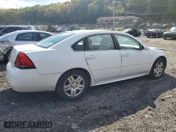 2013 Chevrolet Impala LT with VIN 2G1WG5E31D1113206, listed as a Copart auction lot 86708305 with 140,676 mi miles and Salvage title. Bid and sale history available at DreamBid. Image 3.