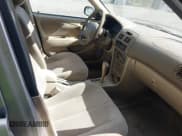 ✅ 1999 Toyota Corolla VE • VIN: 2T1BR12E1XC141396 • Lot: 42969365. Listed on IAAI with 215,831 mi. Free auction sales archive from the USA and detailed vehicle history report at DreamBid. Image 5.