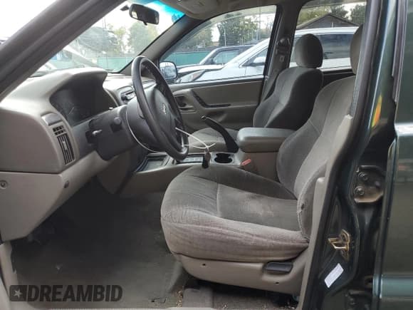 ✅ 2001 Jeep Grand Cherokee Laredo • VIN: 1J4GW48S61C596039 • Lot: 85932785. Listed on Copart with 185,240 mi. Free auction sales archive from the USA and detailed vehicle history report at DreamBid. Image 7.