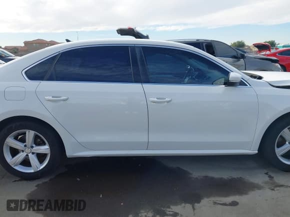 ✅ 2013 Volkswagen Passat SE • VIN: 1VWBP7A39DC036065 • Lot: 43696993. Wystawiony na IAAI z przebiegiem 148 478 mil. Bezpłatny archiwum sprzedaży aukcyjnych z USA i szczegółowy raport historii pojazdu na DreamBid. Zdjęcie 13.