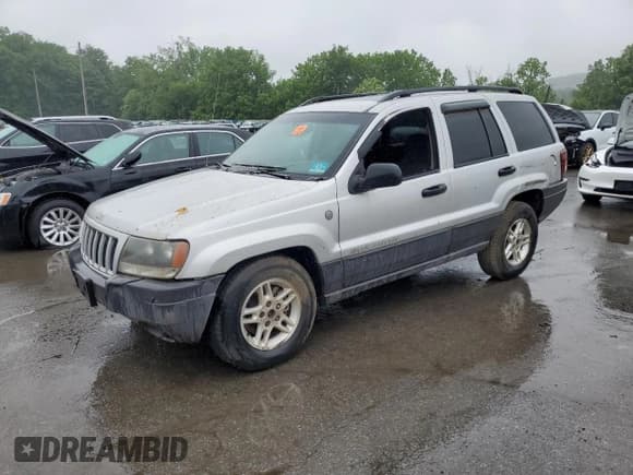 ✅ 2004 Jeep Grand Cherokee Laredo • VIN: 1J4GW48S74C288625 • Lot: 61290805. Listed on Copart with 194,615 mi. Free auction sales archive from the USA and detailed vehicle history report at DreamBid. Image 1.