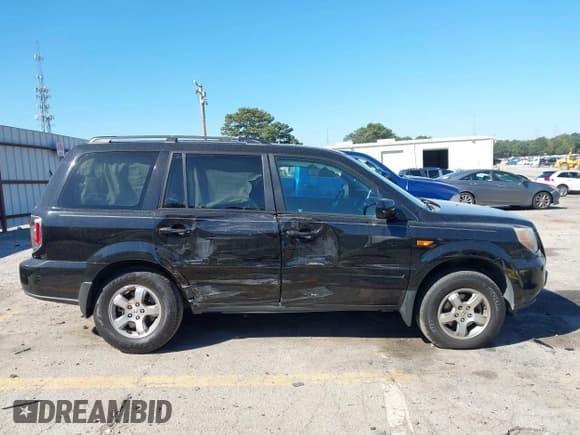 ✅ 2007 Honda Pilot EX • VIN: 5FNYF28457B046312 • Lot: 43398439. Listed on IAAI with 227,147 mi. Free auction sales archive from the USA and detailed vehicle history report at DreamBid. Image 13.