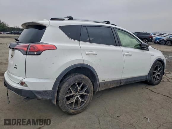 ✅ 2018 Toyota RAV4 Hybrid SE • VIN: JTMJJREV5JD159293 • Lot: 93912485. Listed on Copart with 108,881 mi. Free auction sales archive from the USA and detailed vehicle history report at DreamBid. Image 3.