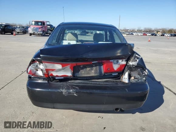 ✅ 1998 Mazda Protege DX • VIN: JM1BC1418W0207690 • Lot: 43252925. Listed on Copart with 143,614 mi. Free auction sales archive from the USA and detailed vehicle history report at DreamBid. Image 6.