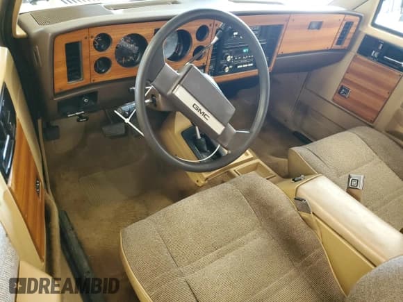 ✅ 1985 GMC Jimmy • VIN: 1G5CT18B1F0519980 • Лот: 66671315. Опубликован ранее на Copart с пробегом 86 382 миль. Бесплатный доступ к архиву аукционных продаж из США и подробный отчёт об истории автомобиля на DreamBid. Изображение 8.