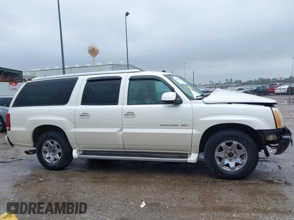 ✅ 2004 Cadillac Escalade ESV • VIN: 3GYFK66N14G313225 • Лот: 41433052. Опубликован ранее на IAAI с пробегом 239 233 миль. Бесплатный доступ к архиву аукционных продаж из США и подробный отчёт об истории автомобиля на DreamBid. Изображение 14.