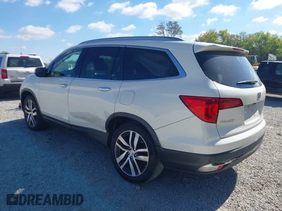 ✅ 2017 Honda Pilot Elite • VIN: 5FNYF6H08HB105293 • Lot: 43451540. Listed on IAAI with 94,862 mi. Free auction sales archive from the USA and detailed vehicle history report at DreamBid. Image 3.