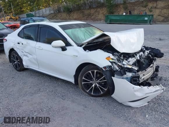 2020 Toyota Camry Hybrid SE z VIN 4T1J31AK6LU536333, wystawiony jako IAAI lot #43088914 z przebiegiem 73 421 mil mil oraz . Historia ofert i sprzedaży dostępna na DreamBid. Obrazek 1.