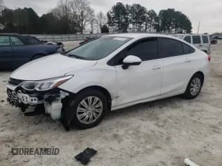 ✅ 2017 Chevrolet Cruze LS • VIN: 1G1BC5SM0H7174143 • Lot: 40271703. Listed on Copart with 59,329 mi. Free auction sales archive from the USA and detailed vehicle history report at DreamBid. Image 1.