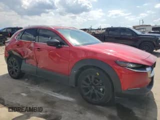 ✅ 2023 Mazda CX-30 Premium • VIN: 3MVDMBDY7PM567619 • Lot: 62834834. Wystawiony na Copart z przebiegiem 7 656 mil. Bezpłatny archiwum sprzedaży aukcyjnych z USA i szczegółowy raport historii pojazdu na DreamBid. Zdjęcie 4.