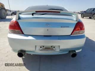 2006 Hyundai Tiburon GT с VIN KMHHN65F96U208668, выставлен на аукционе Copart как лот 50229835 с пробегом 123 075 миль миль и Чистый • Clean title. История ставок и продаж доступна на DreamBid. Изображение 6.