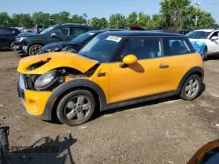 2014 MINI Hardtop with VIN WMWXM5C55ET933502, listed as a Copart auction lot 58491094 with 73,466 mi miles and Salvage title. Bid and sale history available at DreamBid. Image 1.