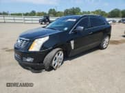 ✅ 2014 Cadillac SRX Premium Collection • VIN: 3GYFNDE31ES580133 • Lot: 71686865. Wystawiony na Copart z przebiegiem 151 152 mil. Bezpłatny archiwum sprzedaży aukcyjnych z USA i szczegółowy raport historii pojazdu na DreamBid. Zdjęcie 1.