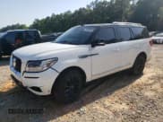 ✅ 2021 Lincoln Navigator Black Label • VIN: 5LMJJ2TT5MEL08415 • Lot: 52850085. Wystawiony na Copart z przebiegiem 51 186 mil. Bezpłatny archiwum sprzedaży aukcyjnych z USA i szczegółowy raport historii pojazdu na DreamBid. Zdjęcie 1.