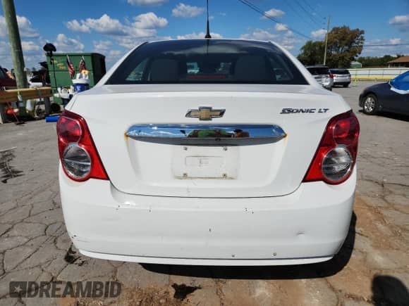 2014 Chevrolet Sonic LT с VIN 1G1JC5SH2E4208885, выставлен на аукционе Copart как лот 84543525 с пробегом 134 412 миль миль и Списание • Salvage title. История ставок и продаж доступна на DreamBid. Изображение 6.