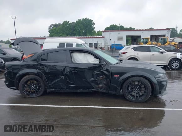 ✅ 2022 Dodge Charger Scat Pack Widebody • VIN: 2C3CDXGJ7NH189505 • Lot: 42113893. Wystawiony na IAAI z przebiegiem 28 649 mil. Bezpłatny archiwum sprzedaży aukcyjnych z USA i szczegółowy raport historii pojazdu na DreamBid. Zdjęcie 13.