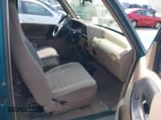 ✅ 1994 Ford Ranger Splash • VIN: 1FTCR15X8RPB51199 • Lot: 42123779. Listed on IAAI with 203,940 mi. Free auction sales archive from the USA and detailed vehicle history report at DreamBid. Image 5.