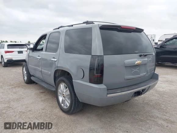 ✅ 2009 Chevrolet Tahoe LTZ • VIN: 1GNFC33099R297719 • Lot: 42064490. Listed on IAAI with 215,466 mi. Free auction sales archive from the USA and detailed vehicle history report at DreamBid. Image 3.