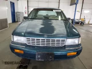 ✅ 1994 Plymouth Acclaim • VIN: 3P3AA46K7RT276936 • Lot: 49509835. Wystawiony na Copart z przebiegiem 176 324 mil. Bezpłatny archiwum sprzedaży aukcyjnych z USA i szczegółowy raport historii pojazdu na DreamBid. Zdjęcie 5.
