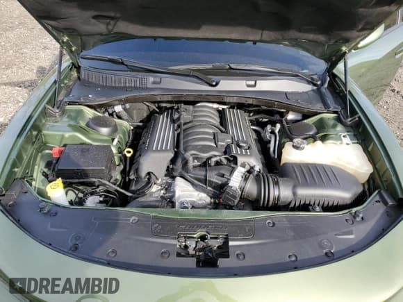 ✅ 2022 Dodge Charger Scat Pack Widebody • VIN: 2C3CDXGJ8NH180439 • Лот: 85277695. Опубликован ранее на Copart с пробегом 28 033 миль. Бесплатный доступ к архиву аукционных продаж из США и подробный отчёт об истории автомобиля на DreamBid. Изображение 11.