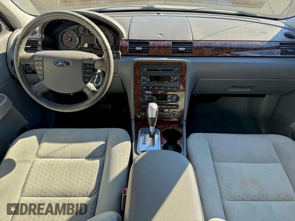 ✅ 2005 Ford Five Hundred SEL • VIN: 1FAFP24195G110683 • Лот: 94933125. Опубликован ранее на Copart с пробегом 50 908 миль. Бесплатный доступ к архиву аукционных продаж из США и подробный отчёт об истории автомобиля на DreamBid. Изображение 9.