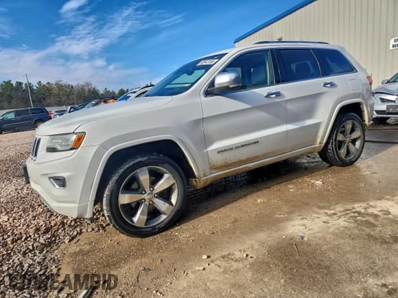 ✅ 2014 Jeep Grand Cherokee Overland • VIN: 1C4RJFCG2EC460377 • Lot: 93543155. Listed on Copart with 128,124 mi. Free auction sales archive from the USA and detailed vehicle history report at DreamBid. Image 1.