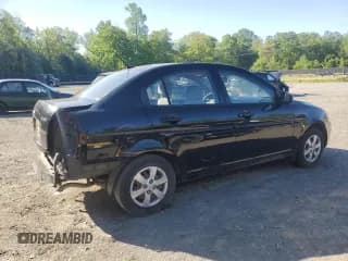 ✅ 2009 Hyundai Accent Auto GLS • VIN: KMHCN46C09U296808 • Лот: 54756365. Опубликован ранее на Copart с пробегом 104 820 миль. Бесплатный доступ к архиву аукционных продаж из США и подробный отчёт об истории автомобиля на DreamBid. Изображение 3.