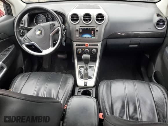 2014 Chevrolet Captiva Sport LT z VIN 3GNAL3EK4ES608344, wystawiony jako Copart lot #84215024 z przebiegiem 146 211 mil mil oraz Szkoda całkowita • Salvage title. Historia ofert i sprzedaży dostępna na DreamBid. Obrazek 8.