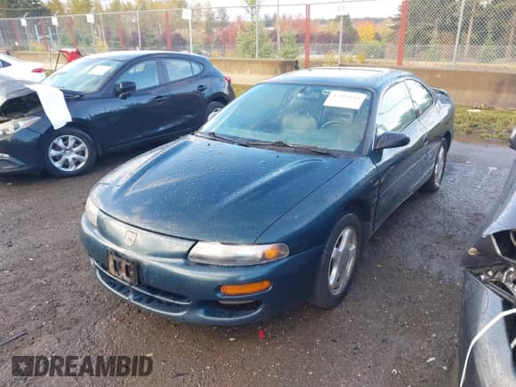 1995 Dodge Avenger z VIN 4B3AU52N9SE215767, wystawiony jako IAAI lot #43494144 z przebiegiem 217 304 mil mil oraz . Historia ofert i sprzedaży dostępna na DreamBid. Obrazek 2.