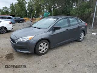✅ 2018 Ford Focus S • VIN: 1FADP3E23JL319942 • Lot: 71437035. Listed on Copart with 96,831 mi. Free auction sales archive from the USA and detailed vehicle history report at DreamBid. Image 1.