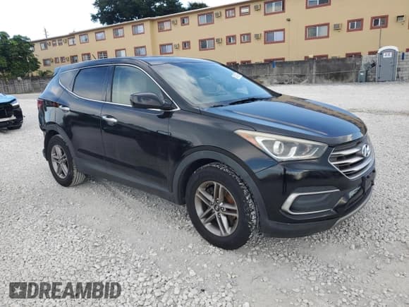 ✅ 2018 Hyundai Santa Fe 2.4L • VIN: 5NMZT3LB2JH066256 • Lot: 87420995. Listed on Copart with 127,034 mi. Free auction sales archive from the USA and detailed vehicle history report at DreamBid. Image 4.