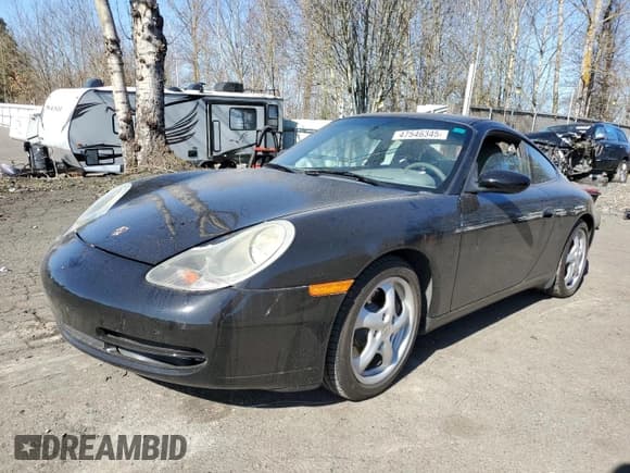 ✅ 2000 Porsche 911 • VIN: WP0AA2993YS621294 • Lot: 47546345. Listed on Copart with Not provided. Free auction sales archive from the USA and detailed vehicle history report at DreamBid. Image 1.