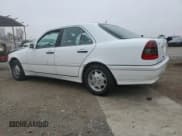 ✅ 2000 Mercedes-Benz C 230 Kompressor • VIN: WDBHA24G1YF946926 • Lot: 70884494. Wystawiony na Copart z przebiegiem 115 791 mil. Bezpłatny archiwum sprzedaży aukcyjnych z USA i szczegółowy raport historii pojazdu na DreamBid. Zdjęcie 2.