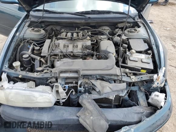 ✅ 1996 Mazda 626 DX • VIN: 1YVGE22C8T5526137 • Lot: 60801585. Listed on Copart with 94,415 mi. Free auction sales archive from the USA and detailed vehicle history report at DreamBid. Image 11.