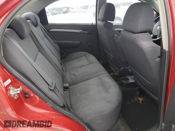 2009 Chevrolet Aveo 1LT z VIN KL1TD56E09B341294, wystawiony jako Copart lot #86139404 z przebiegiem 121 471 mil mil oraz Czysty tytuł • Clean title. Historia ofert i sprzedaży dostępna na DreamBid. Obrazek 10.