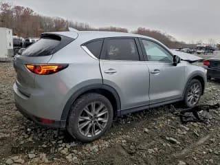 ✅ 2020 Mazda CX-5 Grand Touring • VIN: JM3KFBDM1L0824990 • Lot: 94034265. Wystawiony na Copart z przebiegiem 110 454 mil. Bezpłatny archiwum sprzedaży aukcyjnych z USA i szczegółowy raport historii pojazdu na DreamBid. Zdjęcie 3.