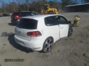 ✅ 2012 Volkswagen Golf GTI w/Conv & Sunroof • VIN: WVWEV7AJ5CW094384 • Lot: 41744860. Listed on IAAI with 157,285 mi. Free auction sales archive from the USA and detailed vehicle history report at DreamBid. Image 4.