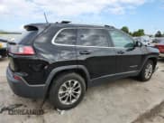 ✅ 2019 Jeep Cherokee Altitude • VIN: 1C4PJMLX9KD112321 • Lot: 80733145. Listed on Copart with 104,912 mi. Free auction sales archive from the USA and detailed vehicle history report at DreamBid. Image 3.