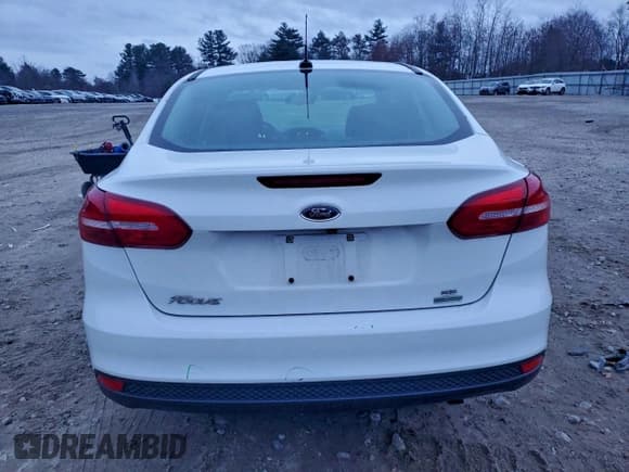 ✅ 2018 Ford Focus SE • VIN: 1FADP3FEXJL232032 • Lot: 94262555. Listed on Copart with 58,718 mi. Free auction sales archive from the USA and detailed vehicle history report at DreamBid. Image 6.
