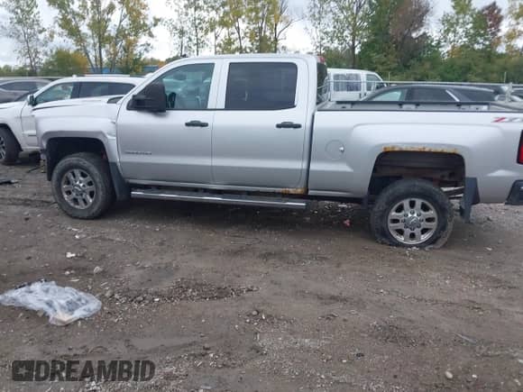 2015 Chevrolet Silverado 2500HD LT with VIN 1GC1KVE87FF107708, listed as a IAAI auction lot 43293267 with 179,538 mi miles and . Bid and sale history available at DreamBid. Image 15.