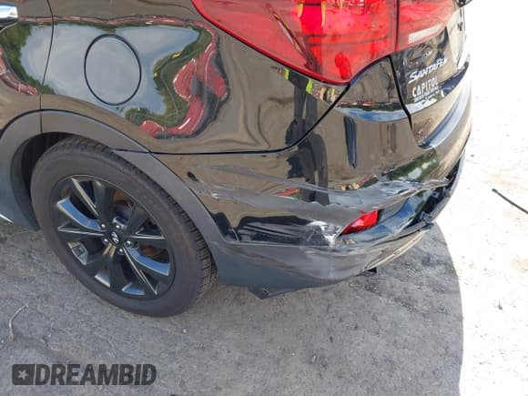 ✅ 2018 Hyundai Santa Fe Ultimate • VIN: 5XYZWDLA7JG508365 • Lot: 42994413. Listed on IAAI with 59,596 mi. Free auction sales archive from the USA and detailed vehicle history report at DreamBid. Image 21.