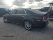 ✅ 2012 Chevrolet Malibu LTZ • VIN: 1G1ZG5E72CF293321 • Lot: 79355424. Listed on Copart with 185,569 mi. Free auction sales archive from the USA and detailed vehicle history report at DreamBid. Image 2.