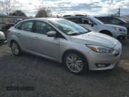 ✅ 2015 Ford Focus Titanium • VIN: 1FADP3J20FL304117 • Lot: 90983835. Listed on Copart with 110,223 mi. Free auction sales archive from the USA and detailed vehicle history report at DreamBid. Image 4.