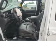 ✅ 2020 Jeep Wrangler Unlimited Sahara Altitude • VIN: 1C4HJXEN3LW162848 • Лот: 65244345. Опубликован ранее на Copart с пробегом Не указан. Бесплатный доступ к архиву аукционных продаж из США и подробный отчёт об истории автомобиля на DreamBid. Изображение 7.