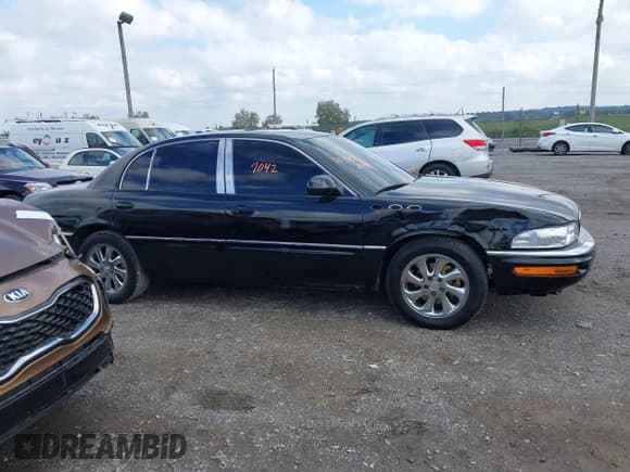 ✅ 2003 Buick Park Avenue Ultra • VIN: 1G4CU541034127034 • Лот: 43307042. Опубликован ранее на IAAI с пробегом 103 312 миль. Бесплатный доступ к архиву аукционных продаж из США и подробный отчёт об истории автомобиля на DreamBid. Изображение 13.