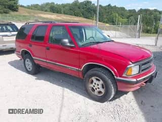 ✅ 1997 Chevrolet Blazer LS • VIN: 1GNDT13WXV2194585 • Lot: 43085722. Listed on IAAI with 228,820 mi miles. Access the free auction sales archive from the USA and view a detailed vehicle history report at DreamBid. Image 1.
