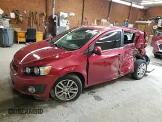 2013 Chevrolet Sonic LT with VIN 1G1JC6SG9D4159485, listed as a Copart auction lot 83822545 with 95,761 mi miles and Salvage title. Bid and sale history available at DreamBid. Image 1.